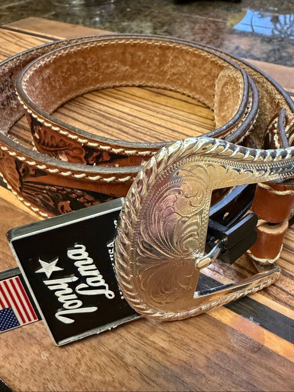 Tony Lama floral tooled western belt and silver buckle
